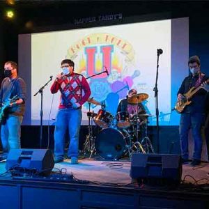 Special needs performance group performing on stage